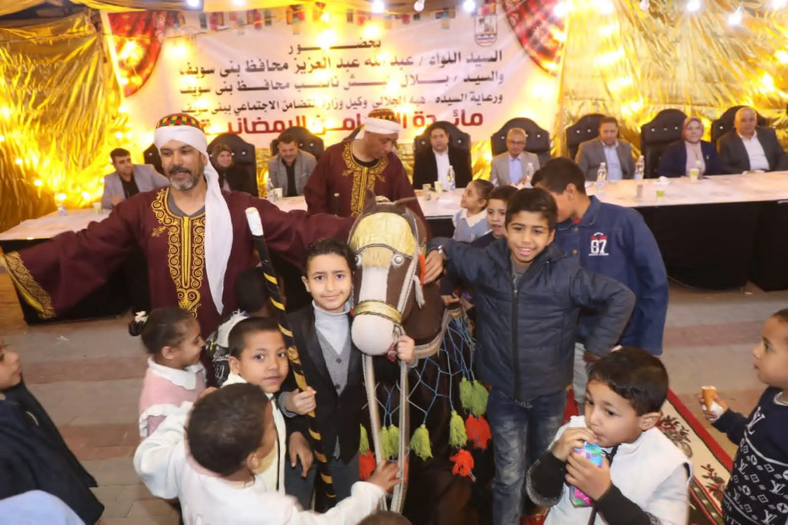محافظ بني سويف يشارك في حفل الإفطار الجماعي للأطفال الأيتام والمسنين من نزلاء دور الرعاية بالمؤسسات الاجتماعية - 1000451901
