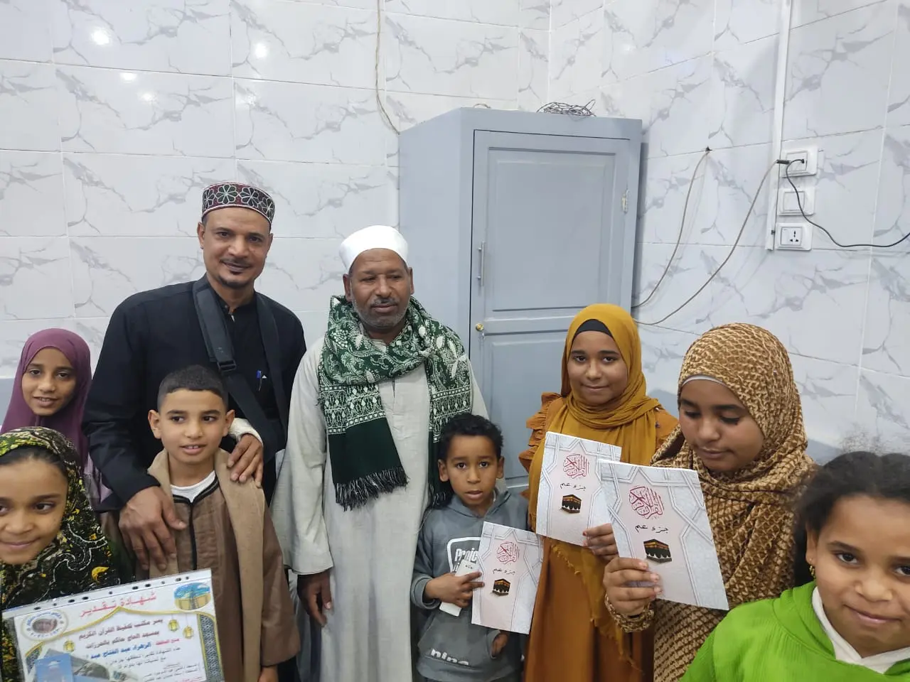 تكريم 135 من حفظة القرآن الكريم في احتفالية كبرى بقرية الحرزات بنقادة - 1000479112