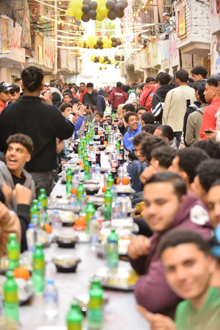 ملحمة "عزبة حمادة".. 15 صورة ترصد إفطار المطرية السنوي في قلب القاهرة - 1000567752