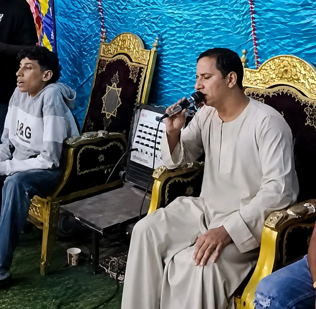 تلاوة القرآن في عزاء قبطي ببني سويف.. «عماد جاد» يلحق بصديق عمره بعد ساعات من وفاته - 1000842260 1