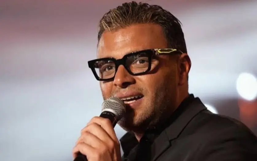 منتج الأغنية الدعائية لفيلم ريد فلاج يكشف تفاصيل أزمة رامي صبري