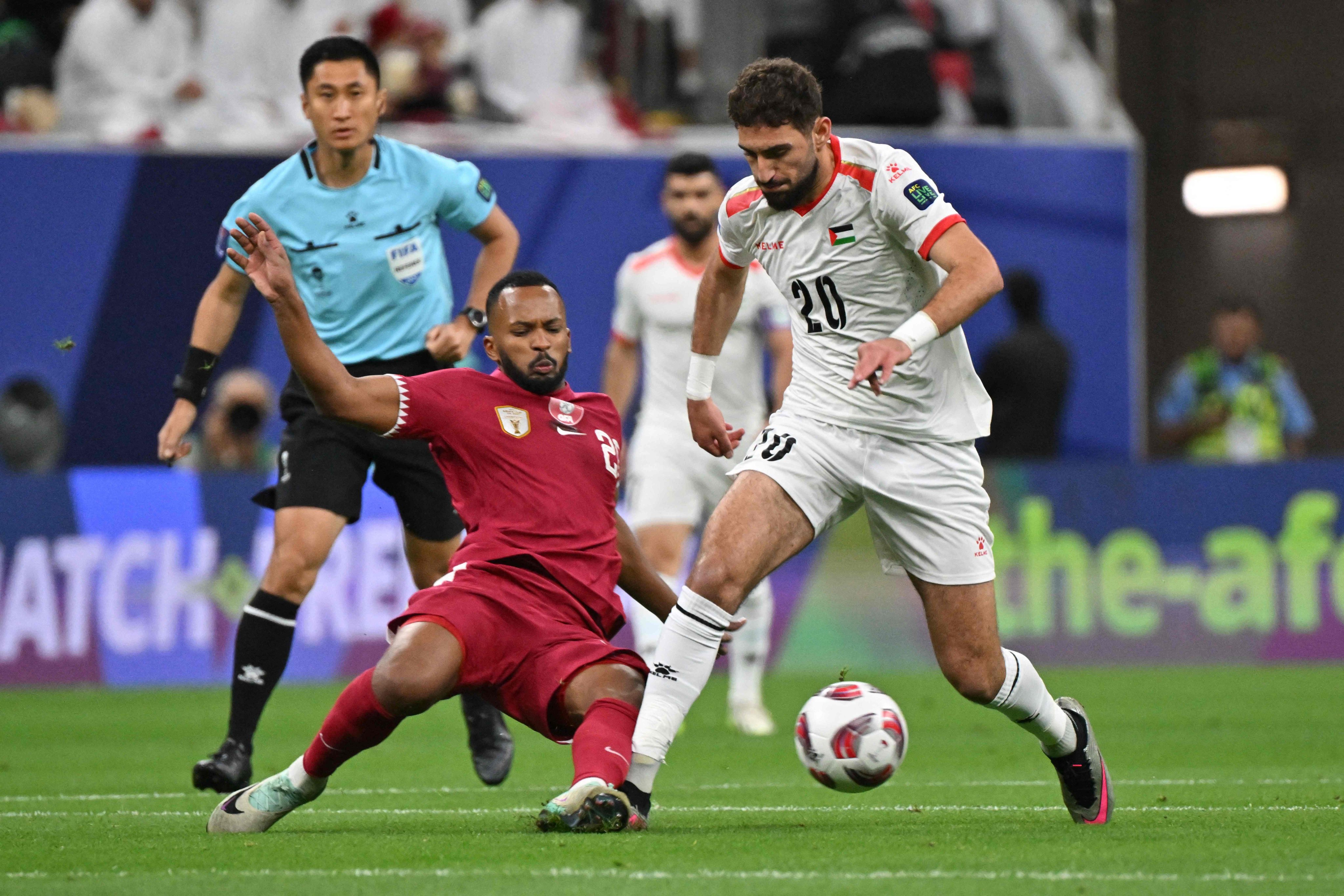 منتخب فلسطين يودع كأس أمم آسيا بالخسارة من قطر .. صور