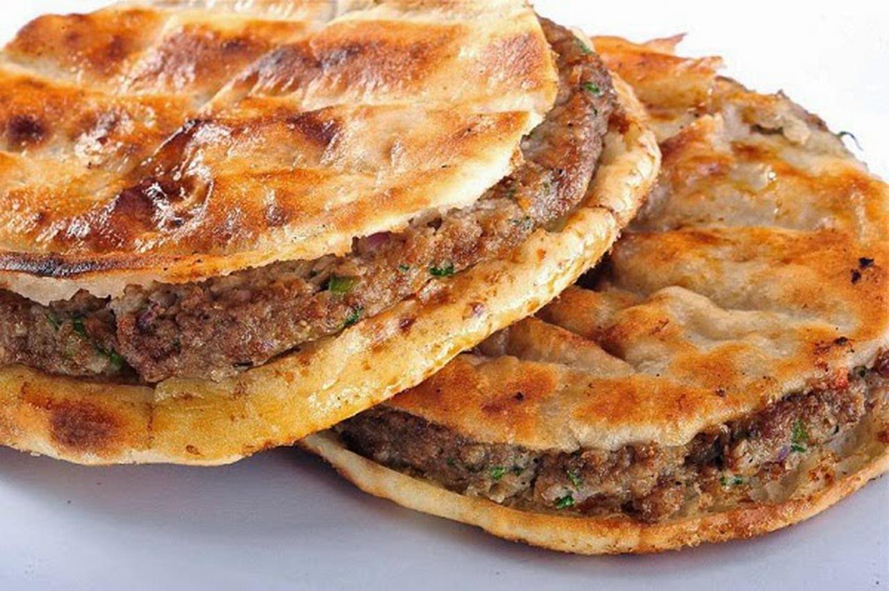 زي المحلات.. تعرف علي طريقة عمل الحواوشي الإسكندراني